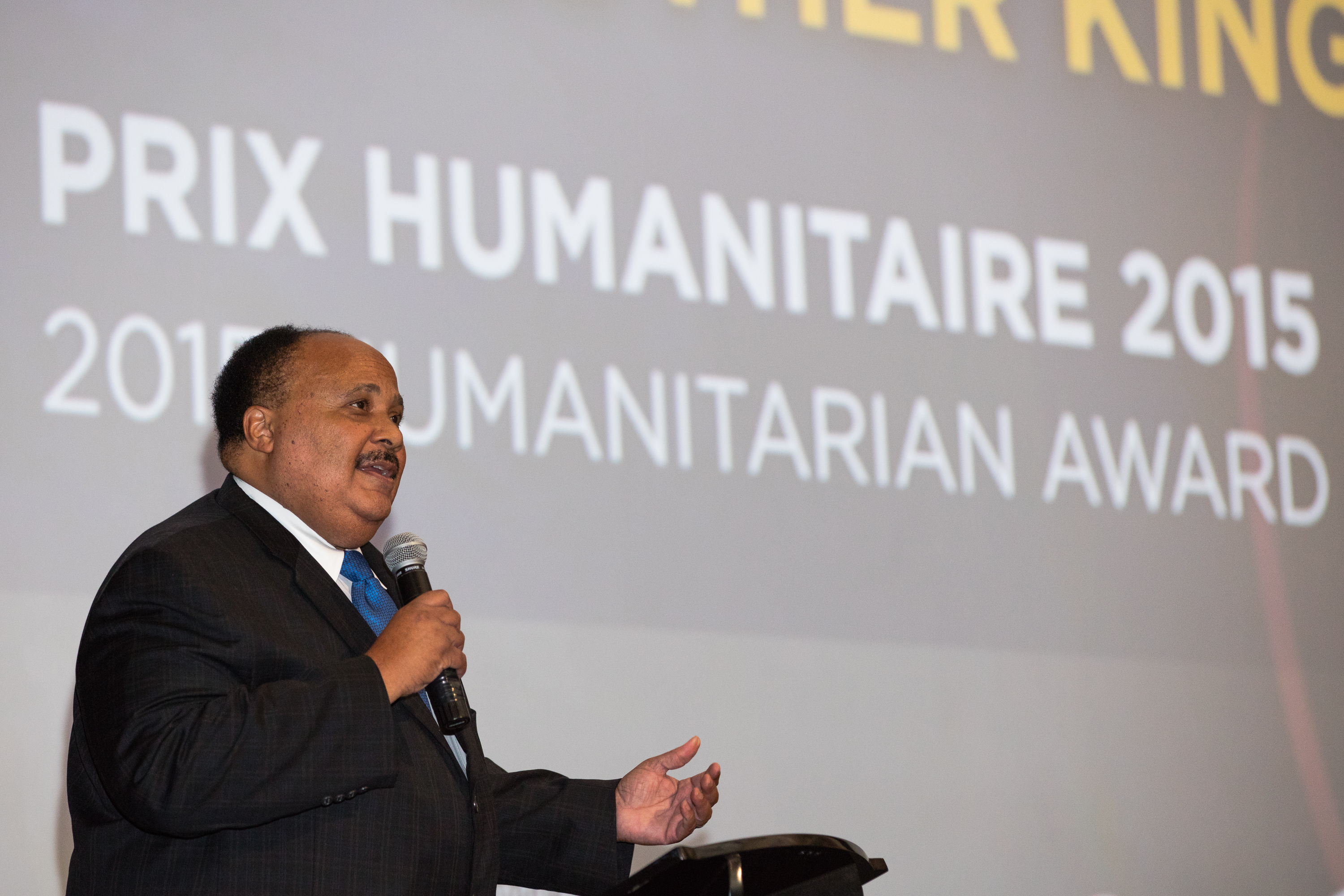 Martin Luther King III on stage giving an acceptance speech. Photo by Marie-Pier Savard.