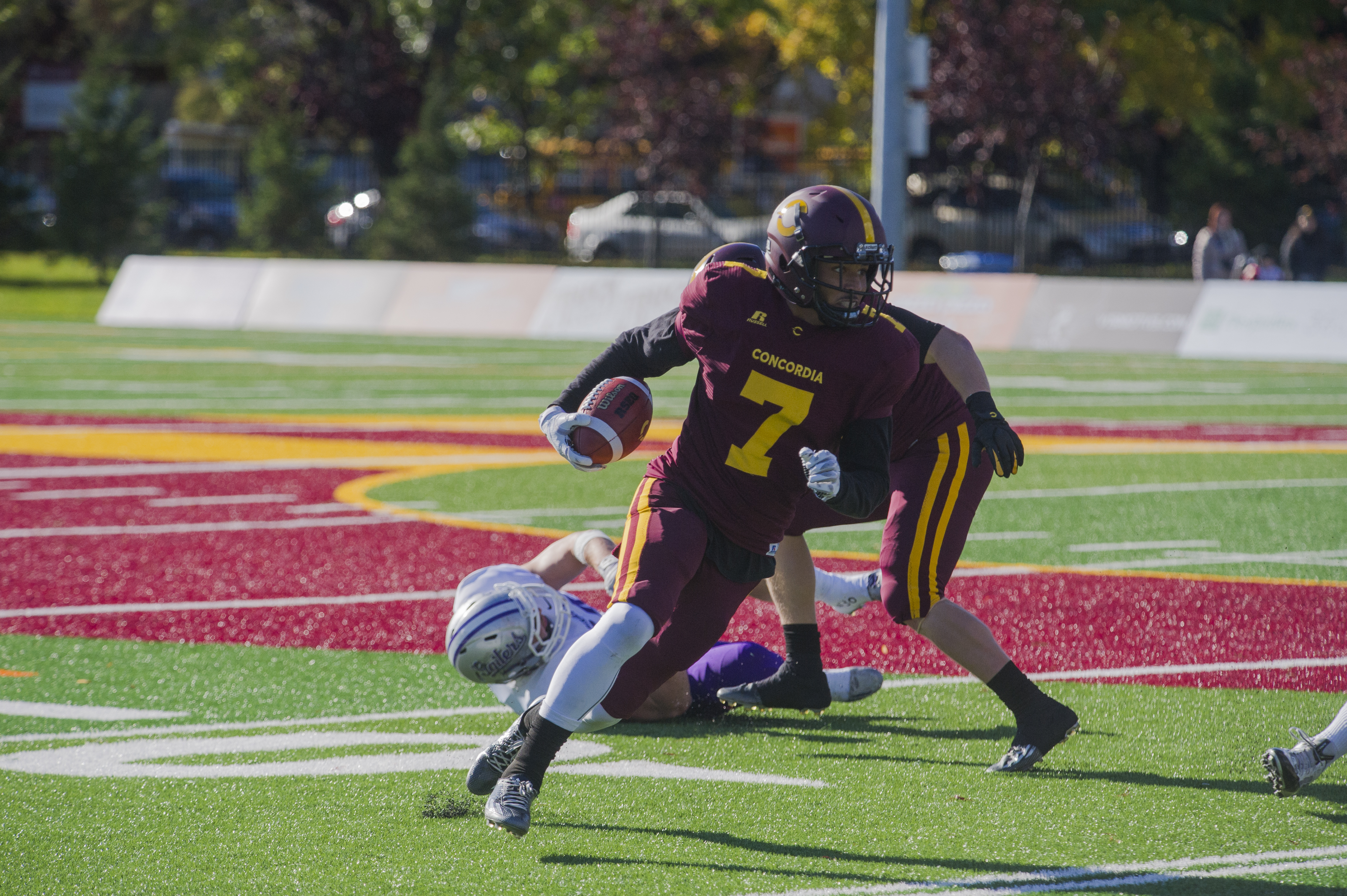 Stingers receiver James Tyrell taking to the open field in Saturday game vs Bishops.  Photo by Andrej Ivanov.