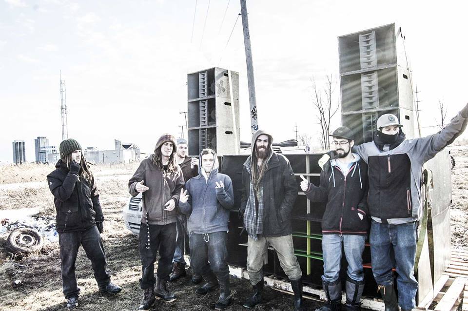 Some MTL Bassix members and friends setting up for Freegloofest (from left to right): Gunnar "Phaedrus" Heiberg, Francis "Lockout" Lussier (from right to left): Jeremy "Jaycore" Jarry-Trottier, Patrick "Propaganja" Labelle, Thomas "Druide" Fournier. Photo by MTL Bassix Production.