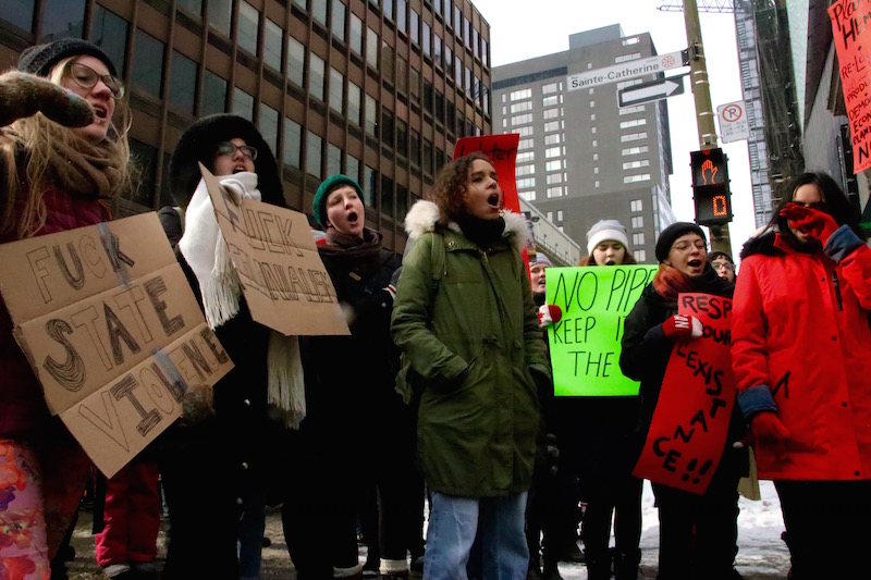 Protesters gathered at the TD Bank location on Ste-Catherine West and de Bleury. Photo by Savanna Craig.