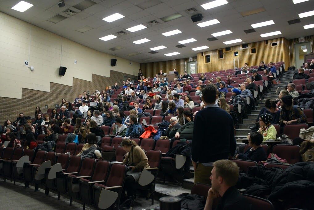 Audience members in the Frank Adams Auditorium on McGill University. Photo by Elisa Barbier.