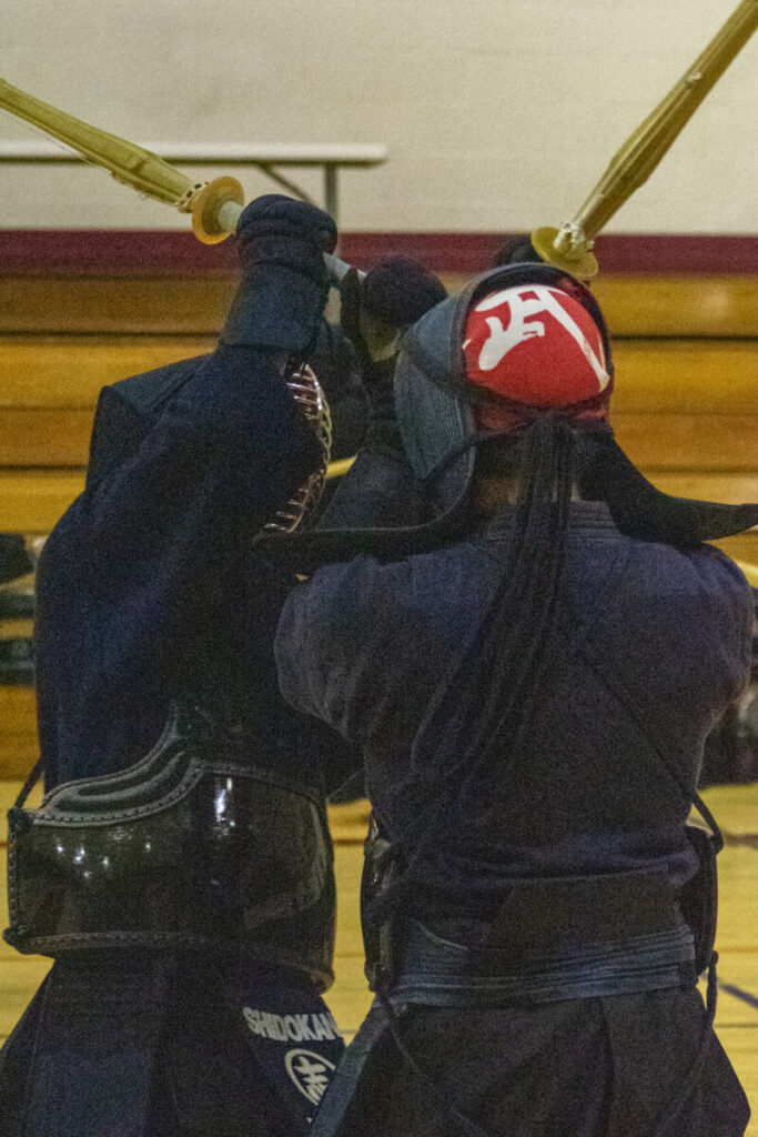 Two students engaging in a sparring match called katas. (Photo by Lucas Marsh)